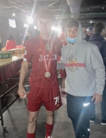 Neco Williams and his young brother Keelan at Anfield Stadium.